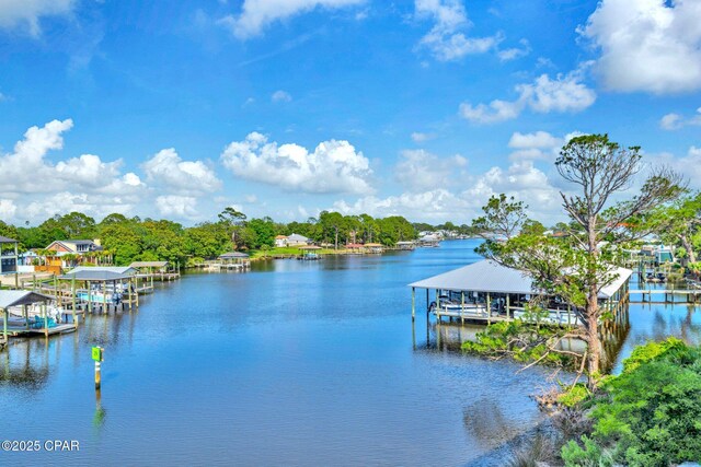 216 Bonita Cir Unit C, Panama City, FL 32408 - dock area with boat lift and a water view
