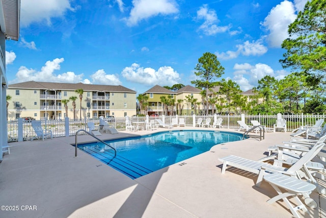216 Bonita Cir Unit C, Panama City, FL 32408 - community pool featuring a patio and a residential view