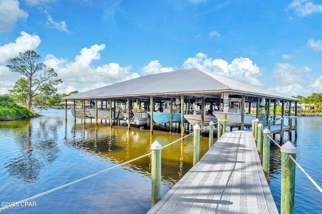 216 Bonita Cir Unit C, Panama City, FL 32408 - dock featuring boat lift and a water view