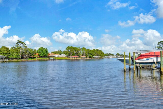 216 Bonita Cir Unit C, Panama City, FL 32408 - dock area with boat lift and a water view