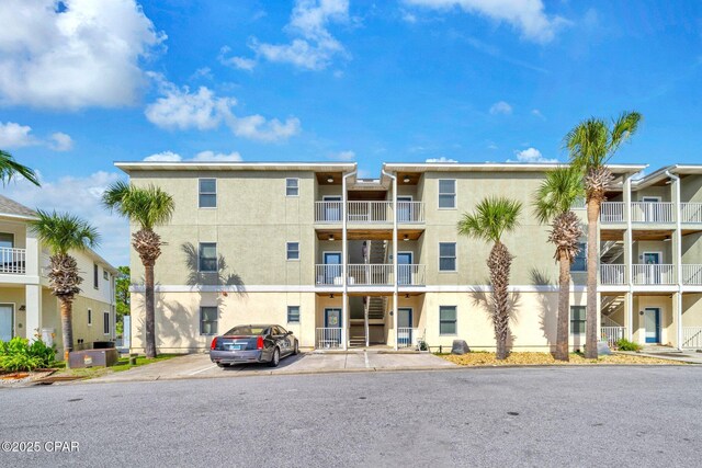 216 Bonita Cir Unit C, Panama City, FL 32408 - view of apartment building / complex with uncovered parking