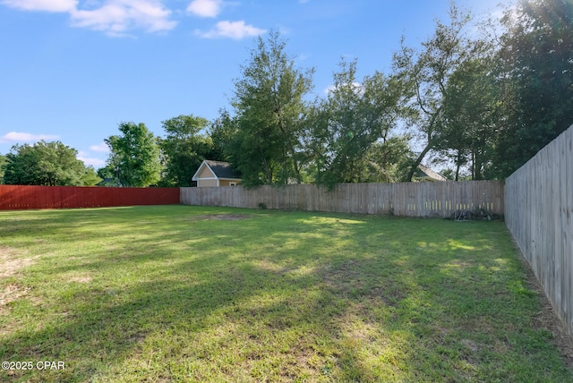 12809 Merial Green Way, Southport, FL 32409 - view of fenced backyard
