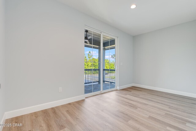 12809 Merial Green Way, Southport, FL 32409 - unfurnished room featuring light wood-style flooring and recessed lighting