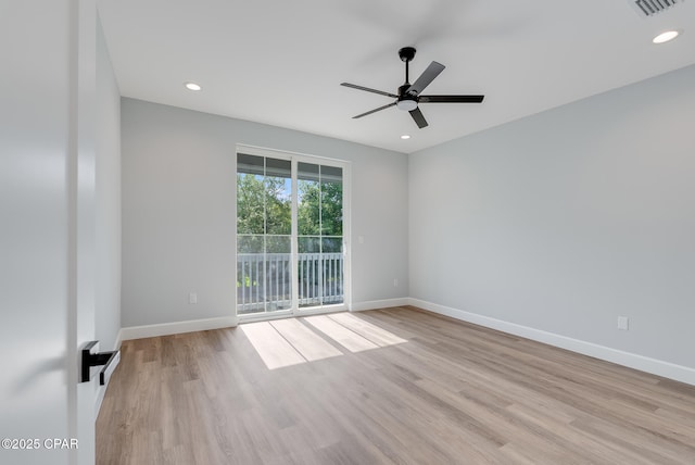 12809 Merial Green Way, Southport, FL 32409 - unfurnished room featuring ceiling fan, wood finished floors, and recessed lighting