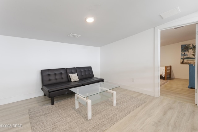 13826 Front Beach Rd, Panama City Beach, FL 32413 - living area with light wood-style flooring and baseboards