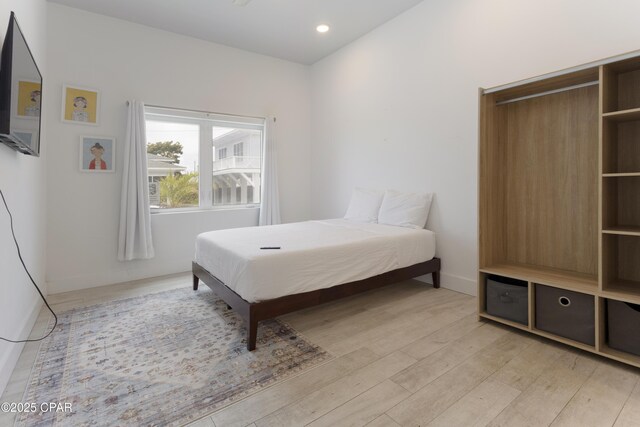 13826 Front Beach Rd, Panama City Beach, FL 32413 - bedroom with light wood finished floors and recessed lighting
