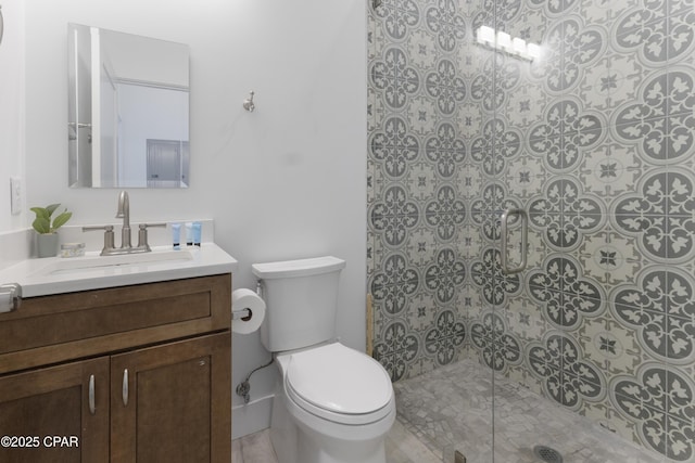 13826 Front Beach Rd, Panama City Beach, FL 32413 - full bathroom with a tile shower, toilet, and vanity