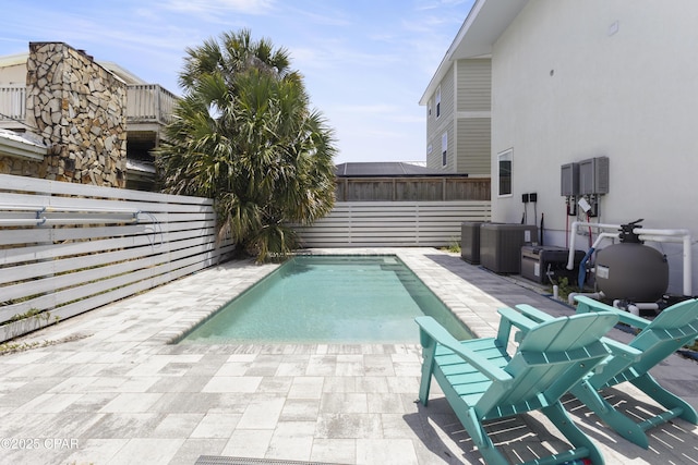 13826 Front Beach Rd, Panama City Beach, FL 32413 - view of swimming pool with a fenced backyard, central AC unit, and a patio area