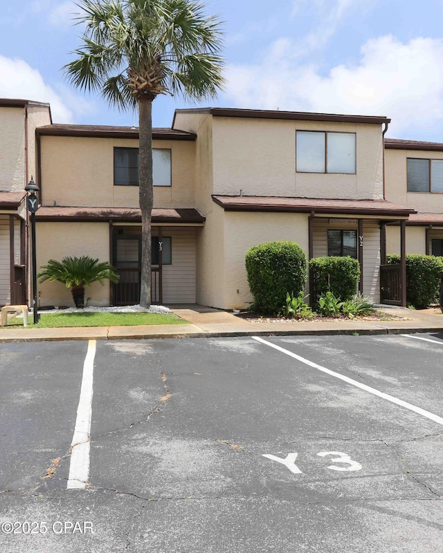 17620 Front Beach Rd Unit Y3, Panama City Beach, FL 32413 - view of building exterior featuring uncovered parking