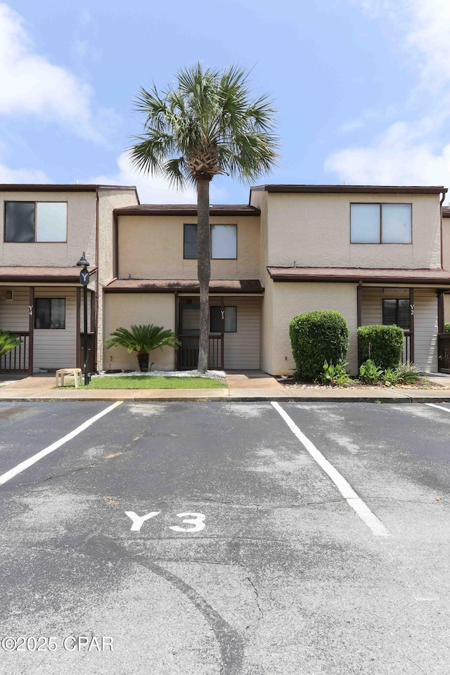 17620 Front Beach Rd Unit Y3, Panama City Beach, FL 32413 - view of building exterior with uncovered parking
