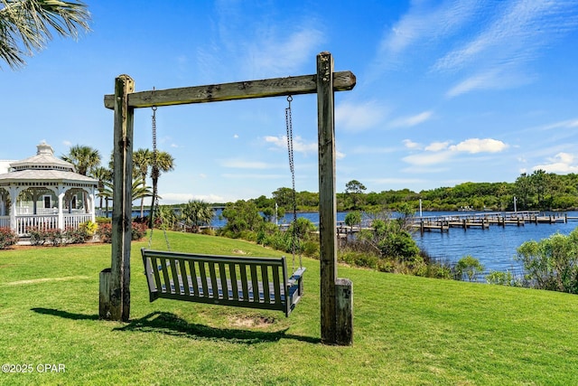 23223 Front Beach Rd Unit A509, Panama City Beach, FL 32413 - view of community featuring a gazebo, a water view, a yard, and a boat dock