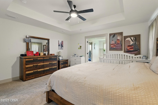 3928 Sandpine Way, Panama City, FL 32404 - bedroom with a raised ceiling, carpet floors, ceiling fan, and baseboards