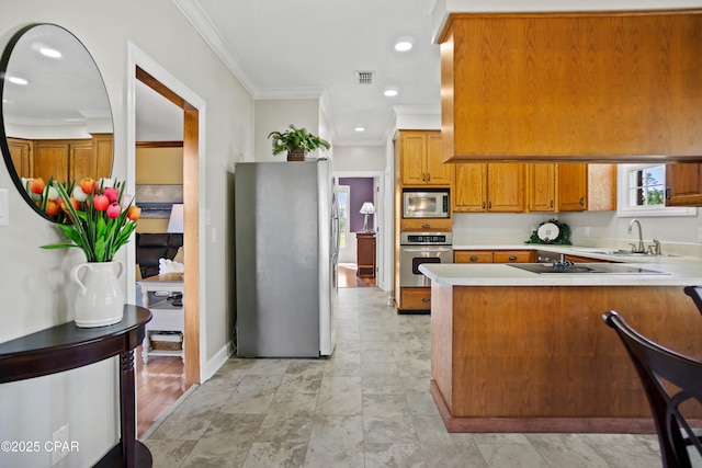 18562 Lois Fowler Rd, Blountstown, FL 32424 - kitchen with appliances with stainless steel finishes, a sink, brown cabinets, crown molding, and a peninsula