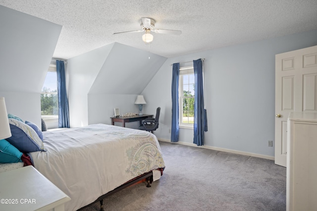 18562 Lois Fowler Rd, Blountstown, FL 32424 - carpeted bedroom with vaulted ceiling, a ceiling fan, a textured ceiling, and baseboards