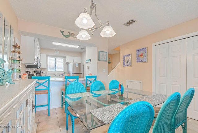 17620 Front Beach Rd Unit 2V, Panama City Beach, FL 32413 - dining area featuring light tile patterned floors