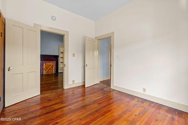 208 N E Ave, Panama City, FL 32401 - unfurnished room with hardwood / wood-style flooring and baseboards
