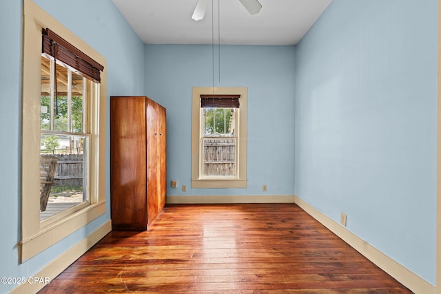 208 N E Ave, Panama City, FL 32401 - empty room featuring hardwood / wood-style flooring, ceiling fan, and baseboards