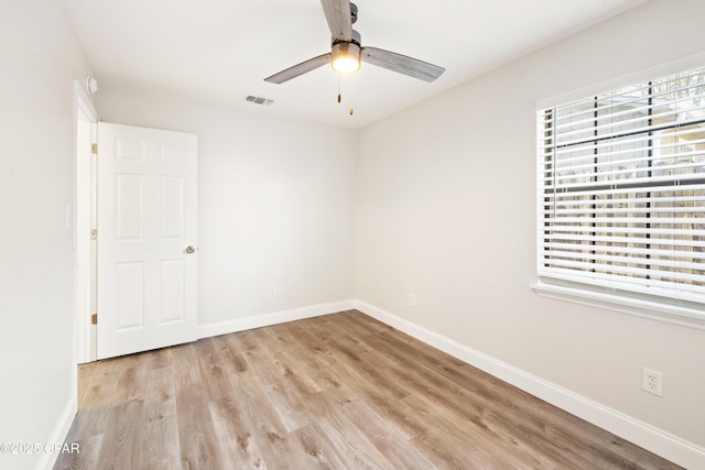 4130 White Pine Ct, Tallahassee, FL 32311 - unfurnished room featuring light wood-style floors, baseboards, and ceiling fan