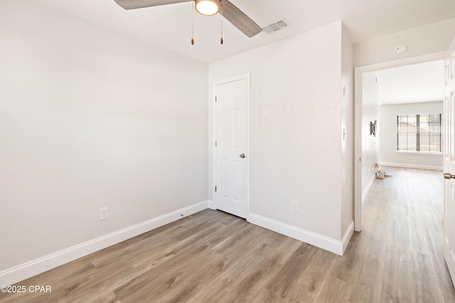 4130 White Pine Ct, Tallahassee, FL 32311 - unfurnished room with light wood-type flooring, baseboards, a ceiling fan, and a smoke detector