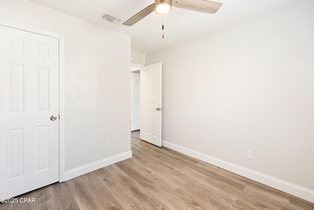 4130 White Pine Ct, Tallahassee, FL 32311 - unfurnished bedroom with light wood finished floors, baseboards, and a ceiling fan