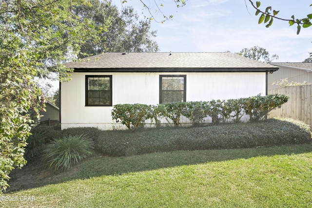 4130 White Pine Ct, Tallahassee, FL 32311 - view of side of home featuring roof with shingles