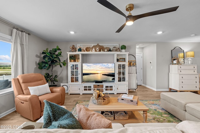 160 James Way, Southport, FL 32409 - living room with ceiling fan, light wood-style flooring, baseboards, and recessed lighting