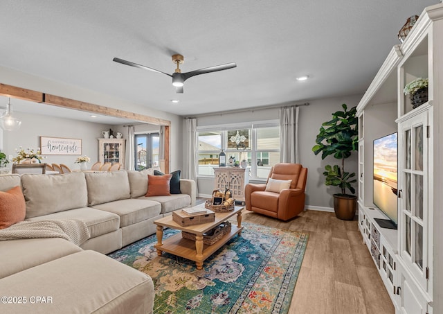 160 James Way, Southport, FL 32409 - living area featuring light wood-type flooring, a ceiling fan, recessed lighting, and baseboards