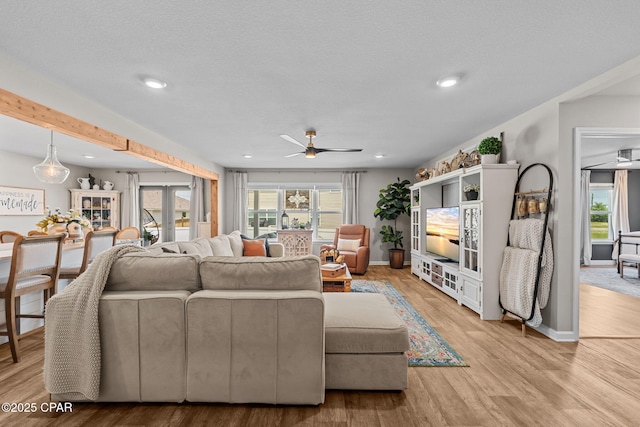 160 James Way, Southport, FL 32409 - living area with plenty of natural light, ceiling fan, recessed lighting, and baseboards