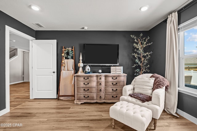 160 James Way, Southport, FL 32409 - sitting room with wood finished floors, baseboards, and recessed lighting