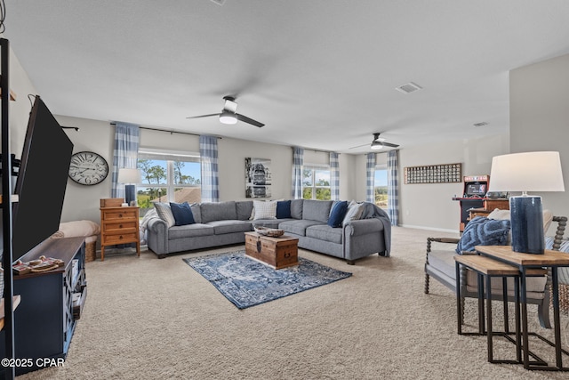160 James Way, Southport, FL 32409 - living area featuring a ceiling fan and carpet
