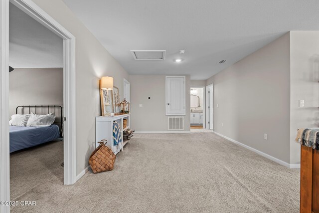 160 James Way, Southport, FL 32409 - living room with carpet flooring, baseboards, and attic access