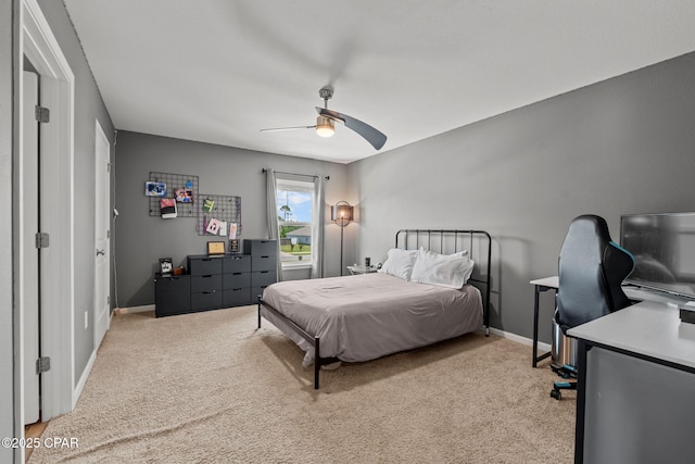 160 James Way, Southport, FL 32409 - bedroom with light carpet, baseboards, an office area, and ceiling fan