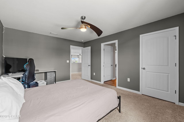 160 James Way, Southport, FL 32409 - carpeted bedroom with baseboards, an office area, and ceiling fan