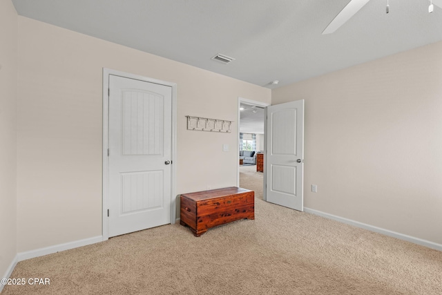 160 James Way, Southport, FL 32409 - carpeted bedroom with baseboards and a ceiling fan