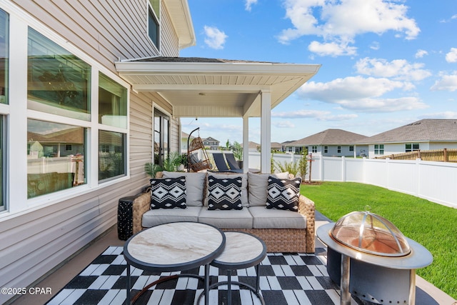 160 James Way, Southport, FL 32409 - view of patio featuring an outdoor living space with a fire pit and a residential view