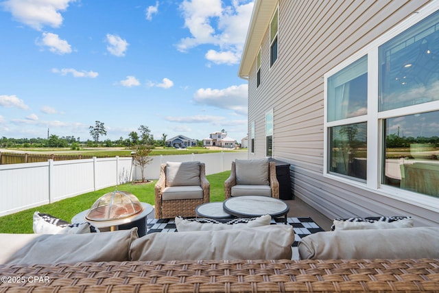 160 James Way, Southport, FL 32409 - fenced backyard with an outdoor living space with a fire pit