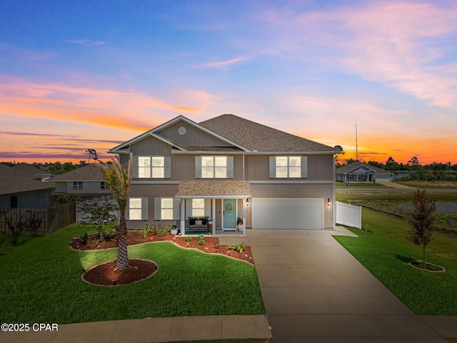160 James Way, Southport, FL 32409 - view of front of house featuring concrete driveway, an attached garage, and a porch