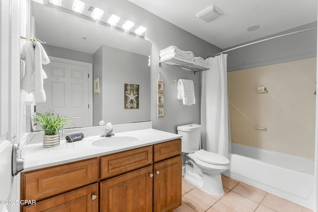 10519 Front Beach Rd Unit 1704B, Panama City Beach, FL 32407 - full bathroom featuring vanity, tile patterned flooring, toilet, and shower / bath combination with curtain