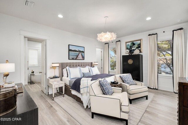 135 Buddy St, Santa Rosa Beach, FL 32459 - bedroom with light wood-style flooring, multiple windows, a chandelier, and recessed lighting
