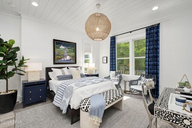 135 Buddy St, Santa Rosa Beach, FL 32459 - bedroom featuring wood finished floors, recessed lighting, ornamental molding, and wooden ceiling