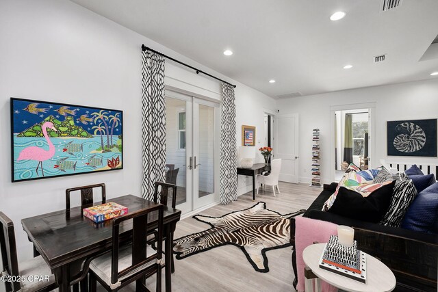 135 Buddy St, Santa Rosa Beach, FL 32459 - living area with french doors, light wood-style flooring, and recessed lighting