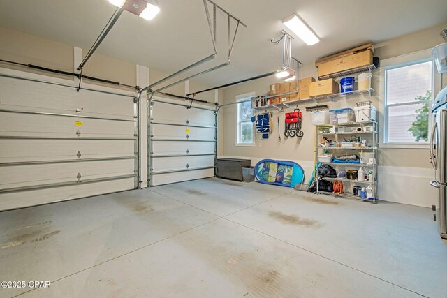 135 Buddy St, Santa Rosa Beach, FL 32459 - garage with freestanding refrigerator