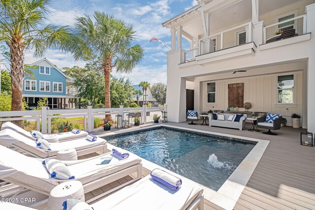 135 Buddy St, Santa Rosa Beach, FL 32459 - view of swimming pool with an outdoor hangout area, a fenced backyard, and a deck