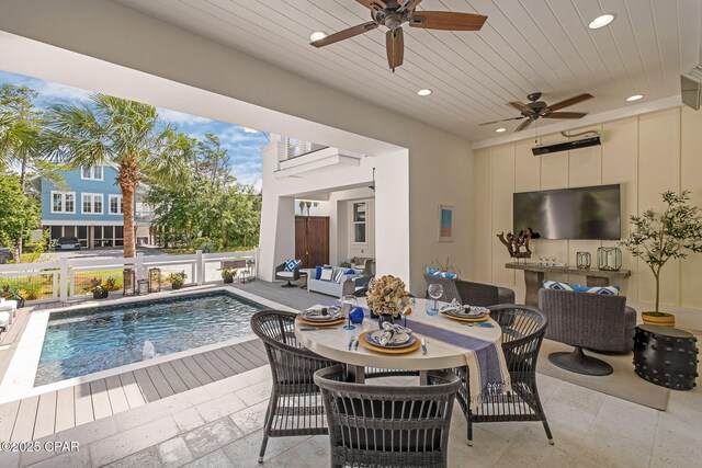 135 Buddy St, Santa Rosa Beach, FL 32459 - swimming pool featuring ceiling fan, an outdoor living space, and a patio
