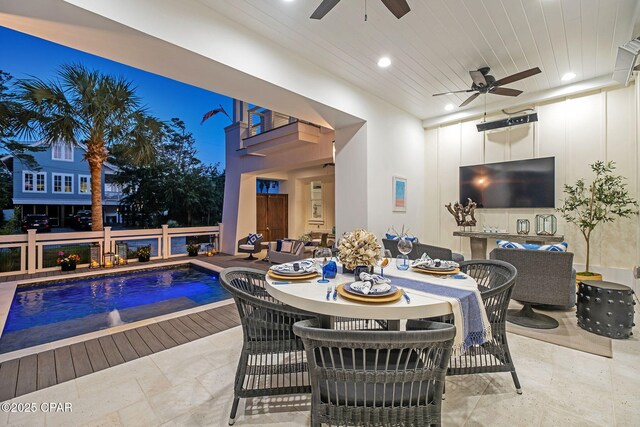 135 Buddy St, Santa Rosa Beach, FL 32459 - swimming pool featuring a ceiling fan, outdoor dining space, and a patio