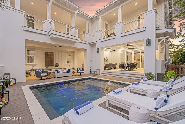 135 Buddy St, Santa Rosa Beach, FL 32459 - swimming pool featuring an outdoor living space, outdoor dining space, and a wooden deck