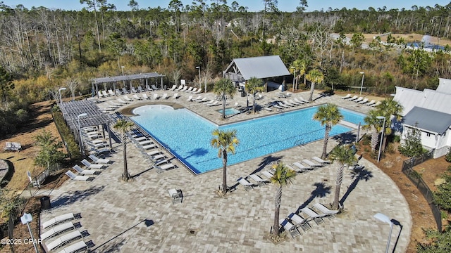 124 Talbot St, Panama City, FL 32409 - community pool with a wooded view and a patio area