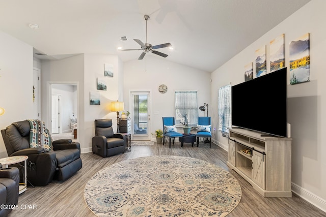 782 Cason Cir, Panama City, FL 32405 - living area with a ceiling fan, baseboards, wood finished floors, and high vaulted ceiling