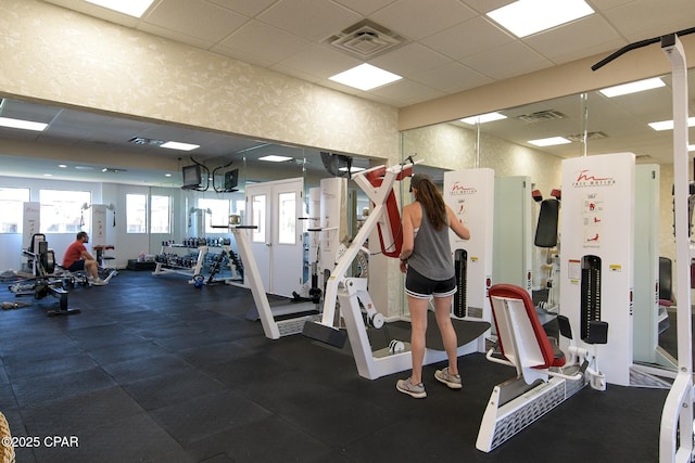 11619 Front Beach Rd Unit 1110, Panama City Beach, FL 32407 - workout area with a drop ceiling and wallpapered walls