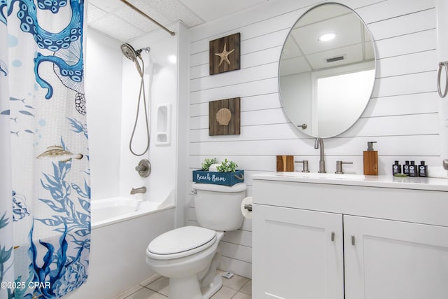 14701 Front Beach Rd Unit 1727, Panama City Beach, FL 32413 - full bathroom with tile patterned flooring, toilet, vanity, shower / bath combo with shower curtain, and a paneled ceiling